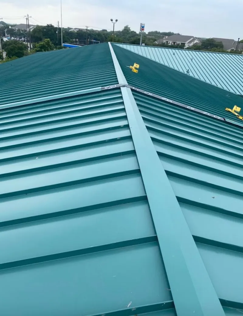 Green commercial metal roof ridge and valley for Metal Roof Repair in Tukwila